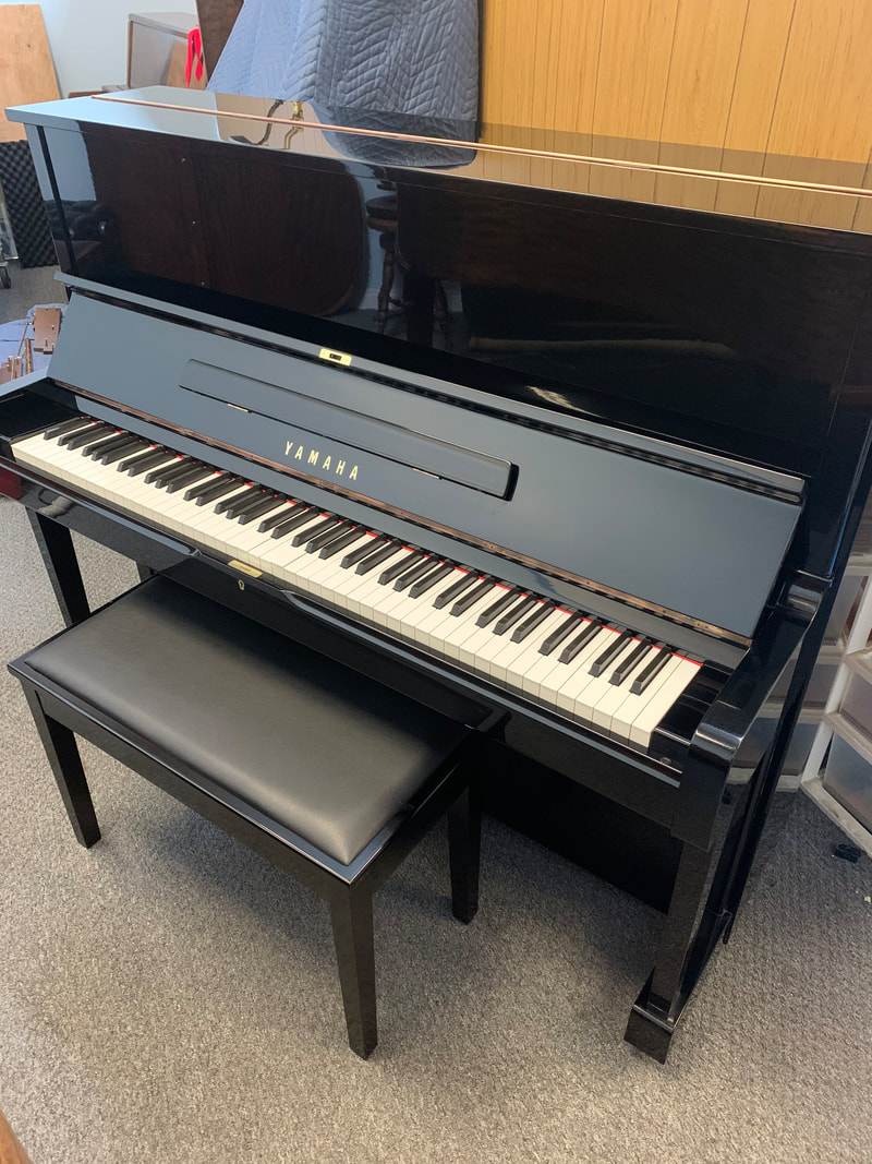 Grinnell Bros upright piano