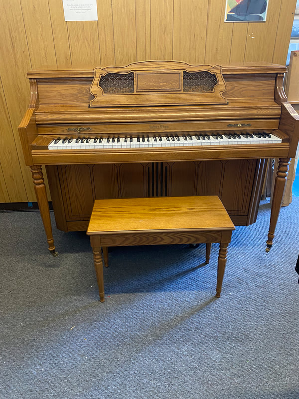 Wurlitzer console upright piano